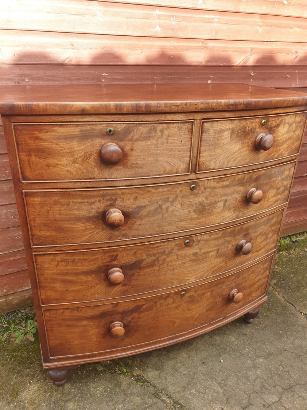 Good practical Regency mahogany bow front chest of drawers  View IV