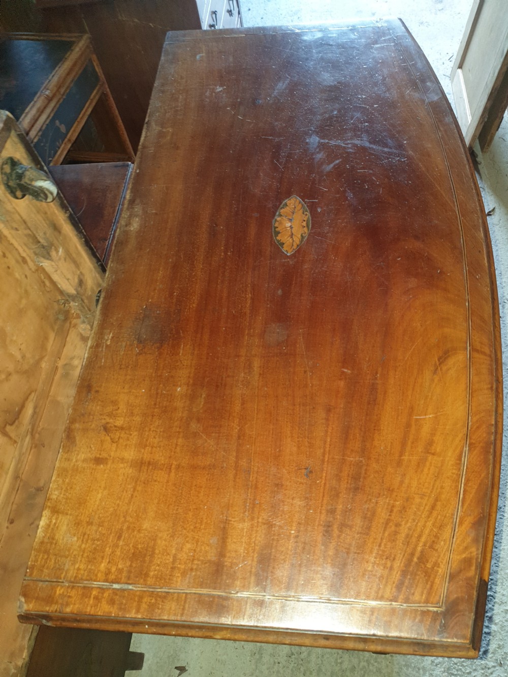 19th century inlaid bow front chest. View V