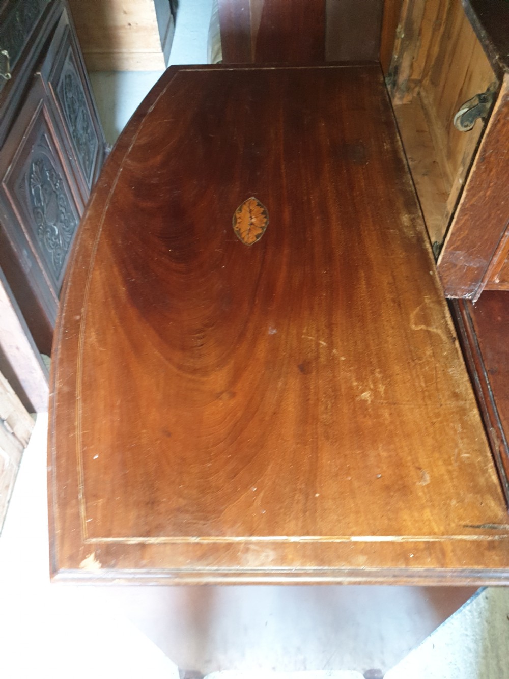 19th century inlaid bow front chest. View VI
