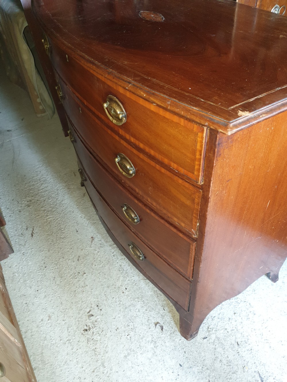 19th century inlaid bow front chest. View VII