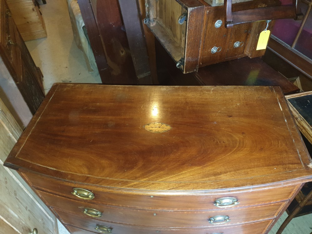 19th century inlaid bow front chest. View VIII
