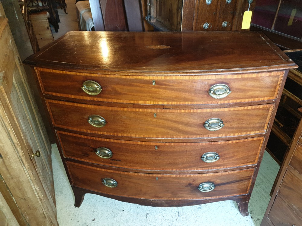 19th century inlaid bow front chest. View IX