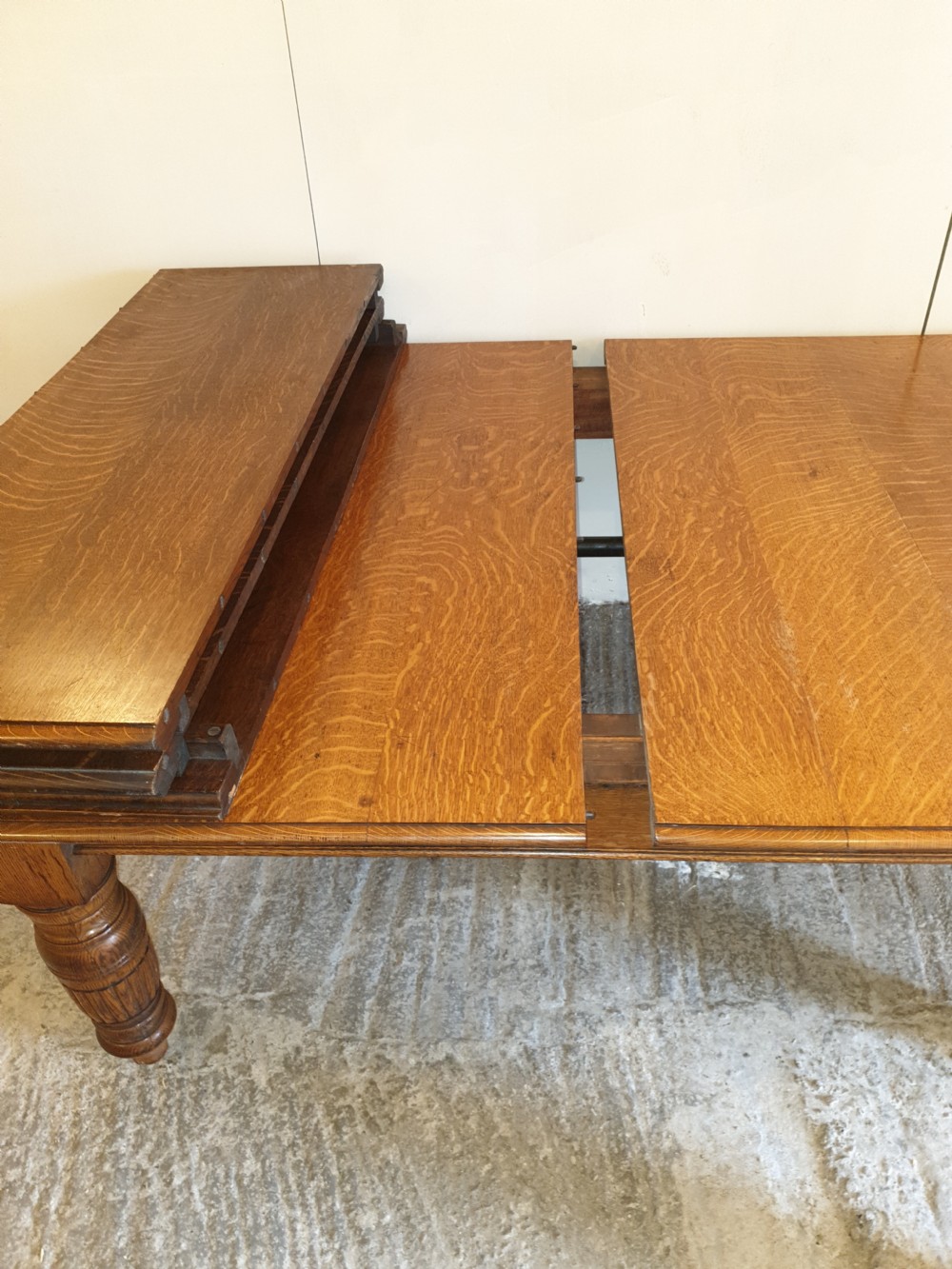Large Victorian oak extending dining table.  View II