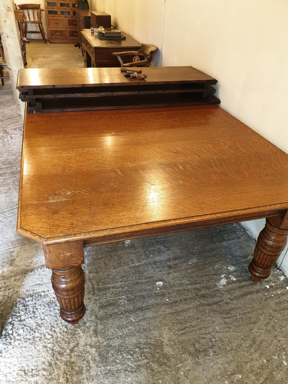 Large Victorian oak extending dining table.  View IV