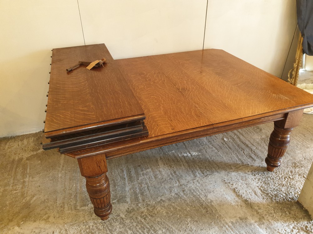Large Victorian oak extending dining table.  View VI
