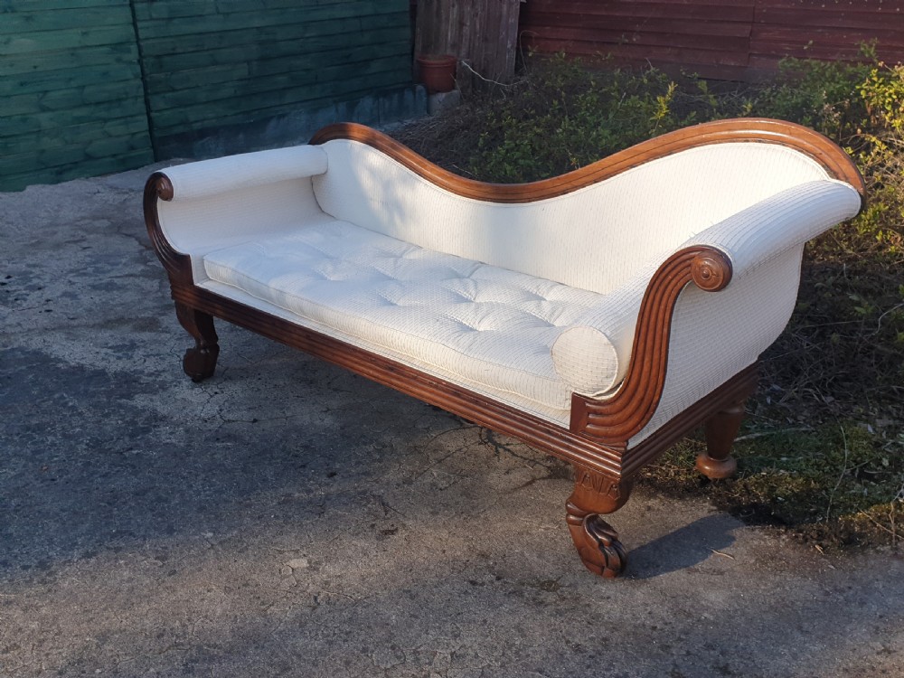 19th century mahogany shaped chaise on carved legs. View II