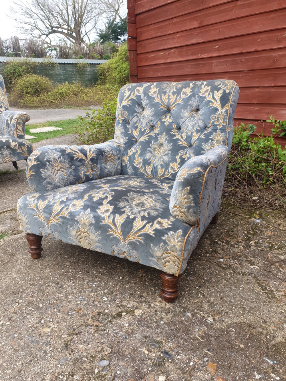 Victorian upholstered armchair in the style of Howard 