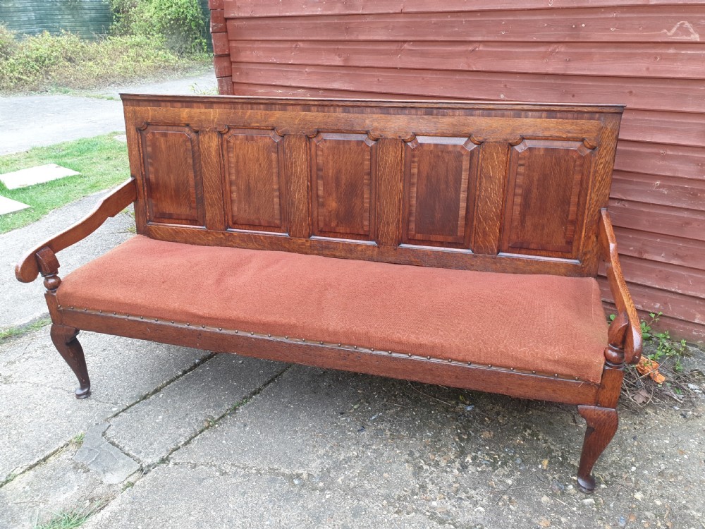 Late Georgian cross banded Oak settle 