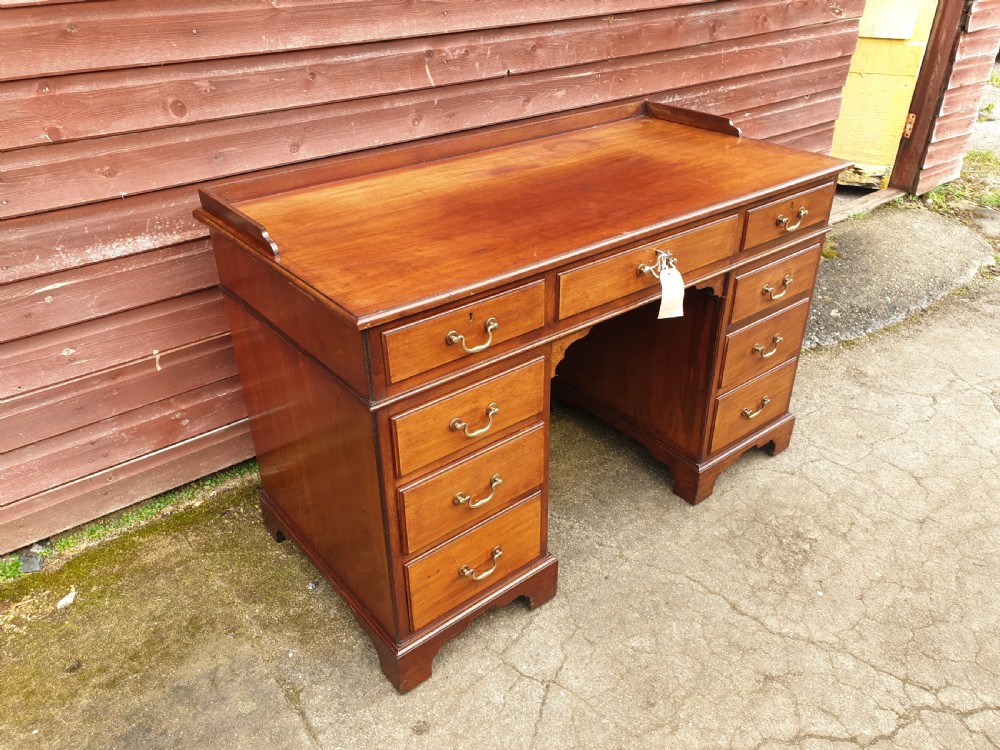 Edwardian mahogany kneehole pedestal desk  View II