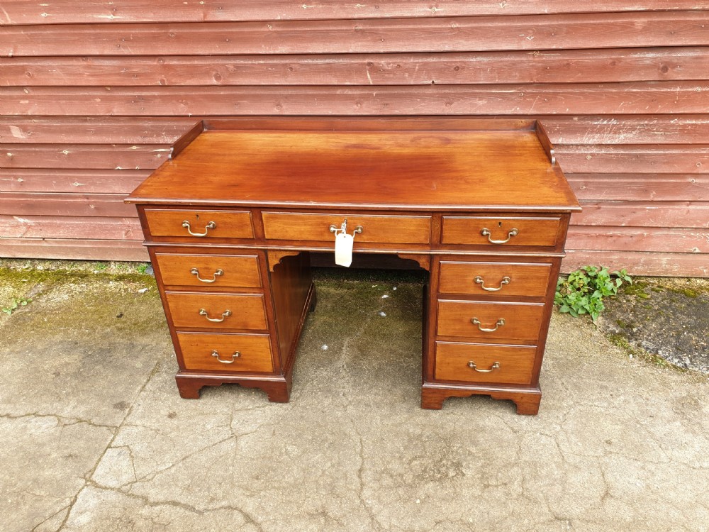 Edwardian mahogany kneehole pedestal desk  View IV