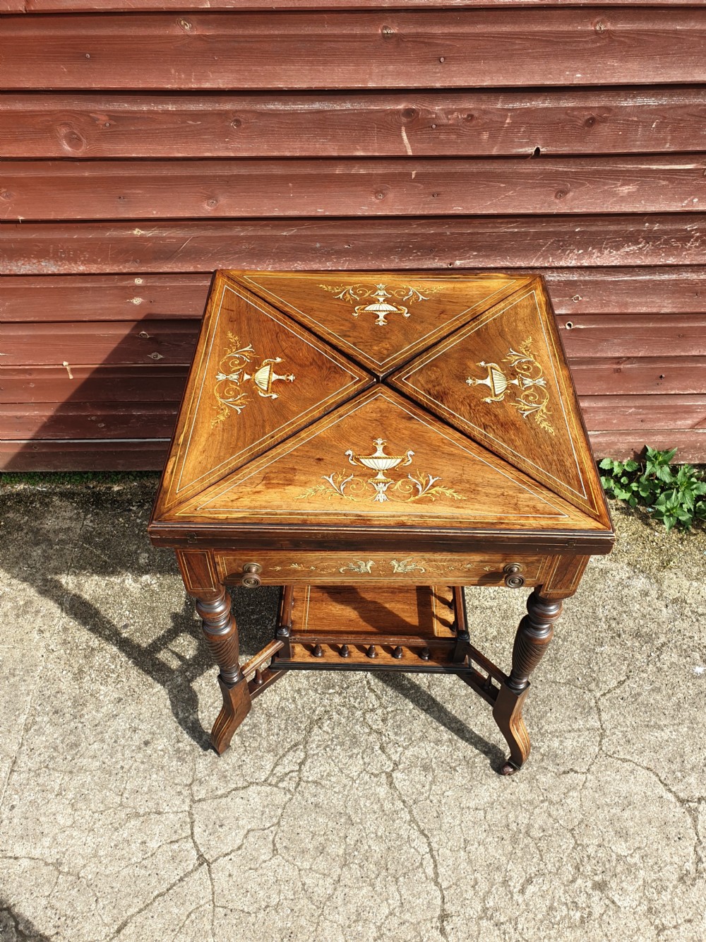 Late Victorian inlaid rosewood envelope card table 