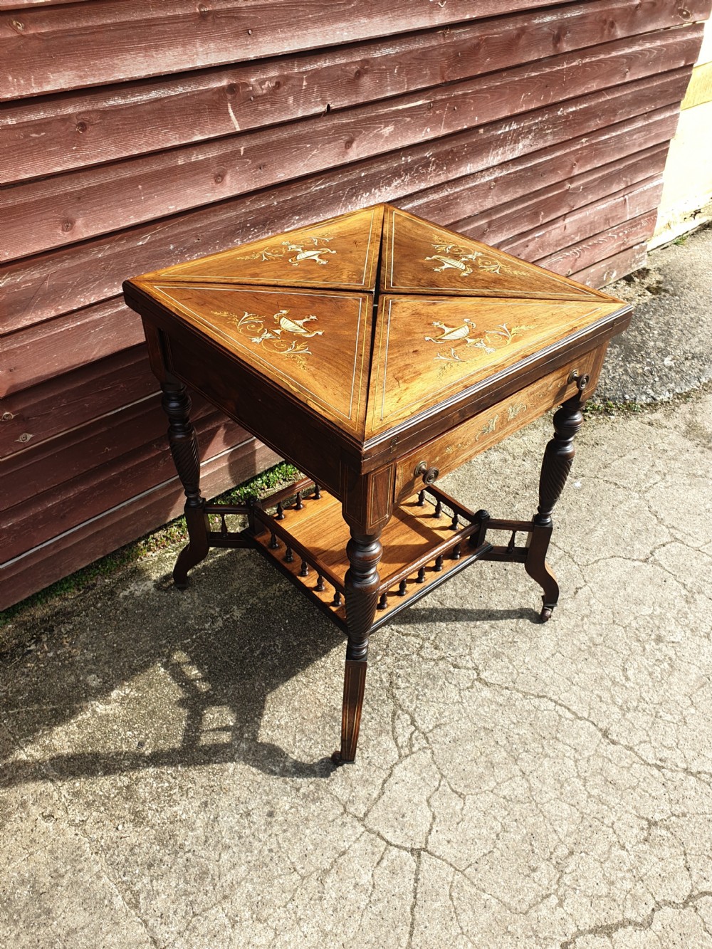 Late Victorian inlaid rosewood envelope card table  View II