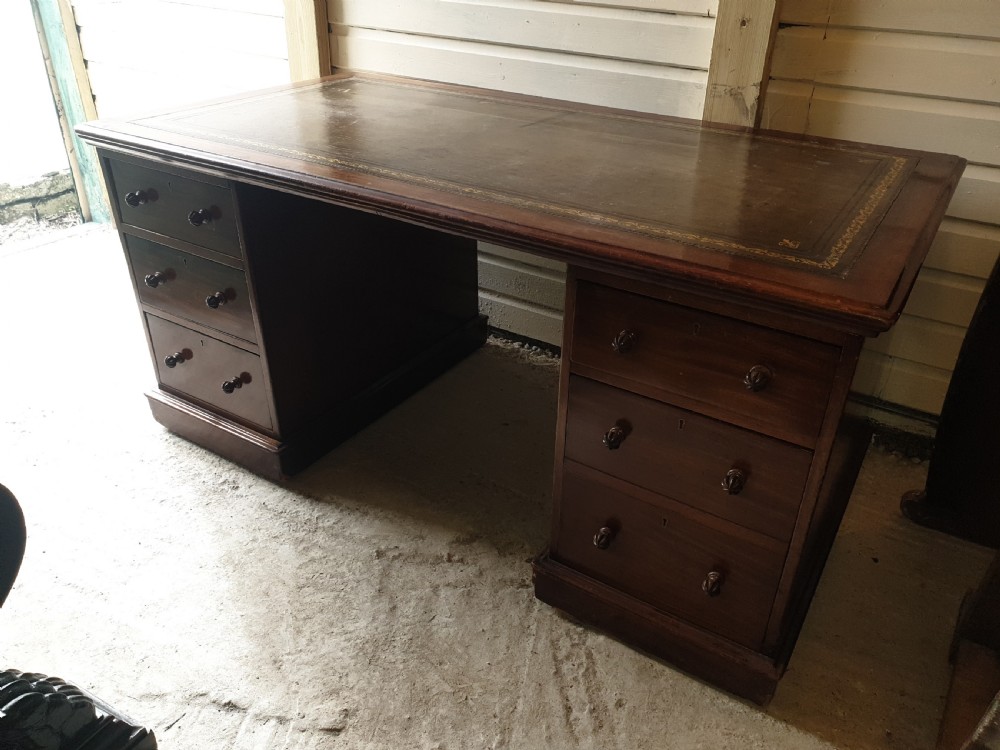 Victorian mahogany kneehole pedestal desk with makers stamp.  View VII