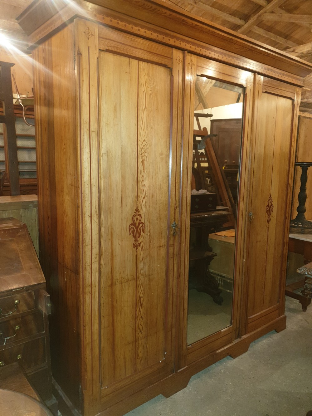Victorian decorated pine triple wardrobe  