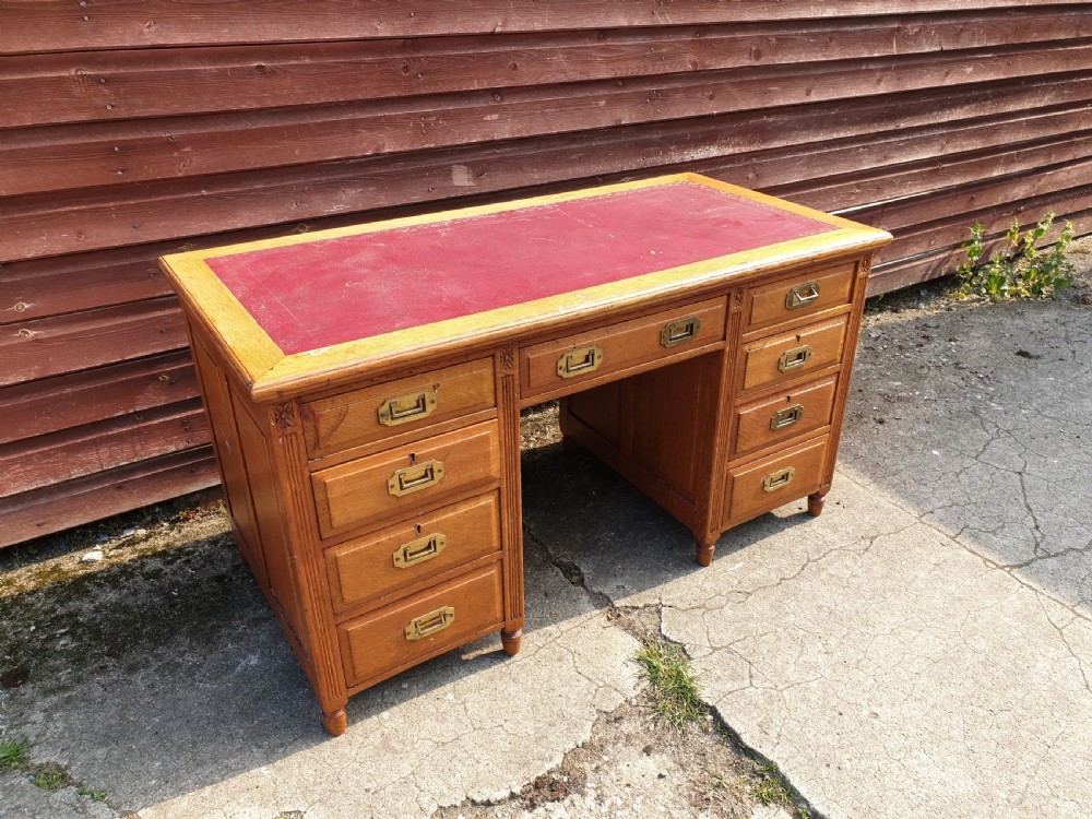 Edwardian oak kneehole pedestal desk 