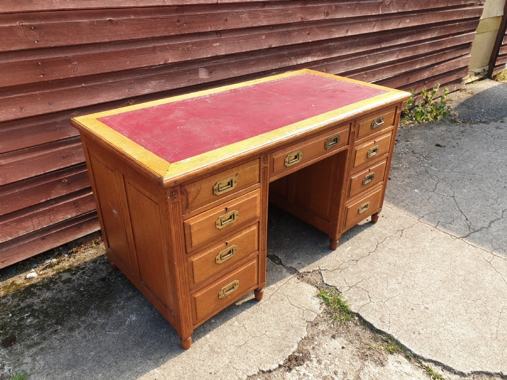 Edwardian oak kneehole pedestal desk  View III