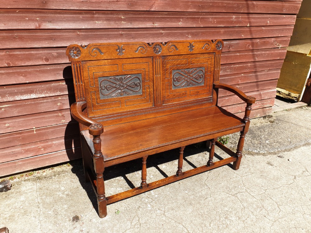 Edwardian oak carved panelled hall seat View V