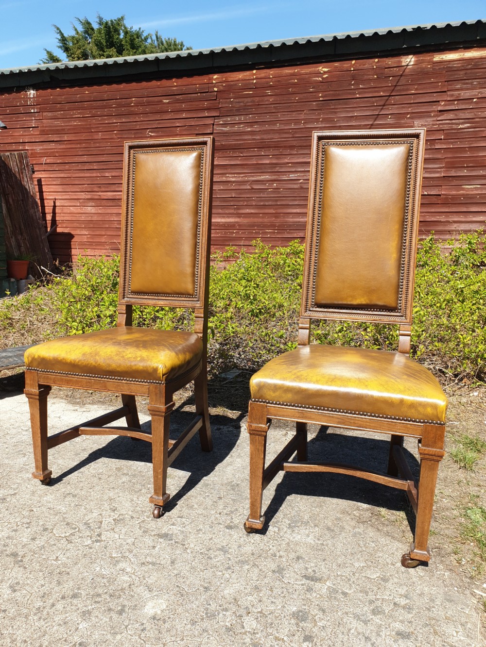 Pair of Late Victorian oak frame hall chairs. View II