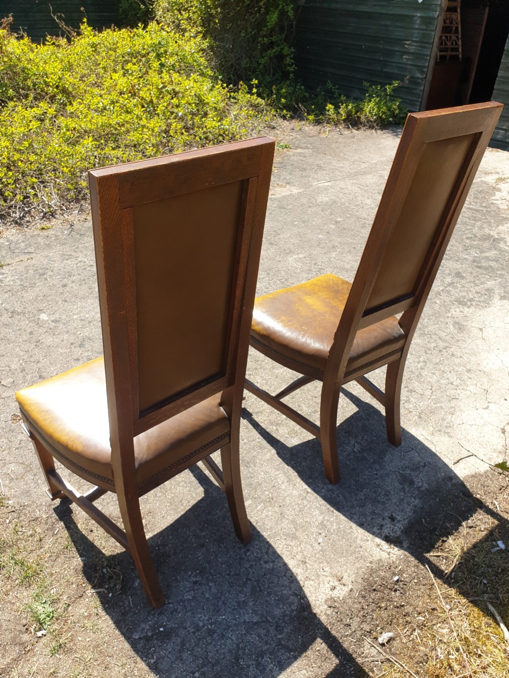 Pair of Late Victorian oak frame hall chairs. View III
