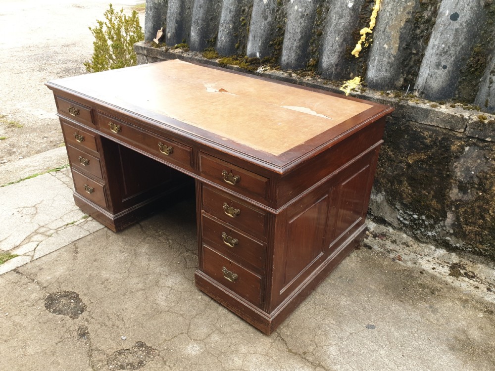 Mahogany panelled kneehole pedestal desk.  View II