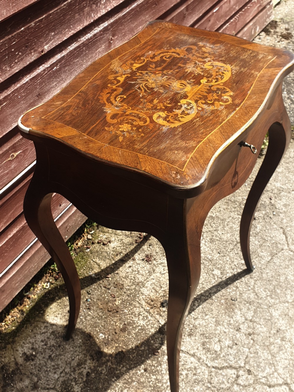 Late 19th century inlaid rosewood side table with lift up lid. View V