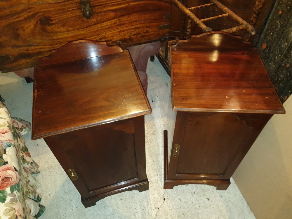Pair of very similar mahogany bedside cabinets  View II