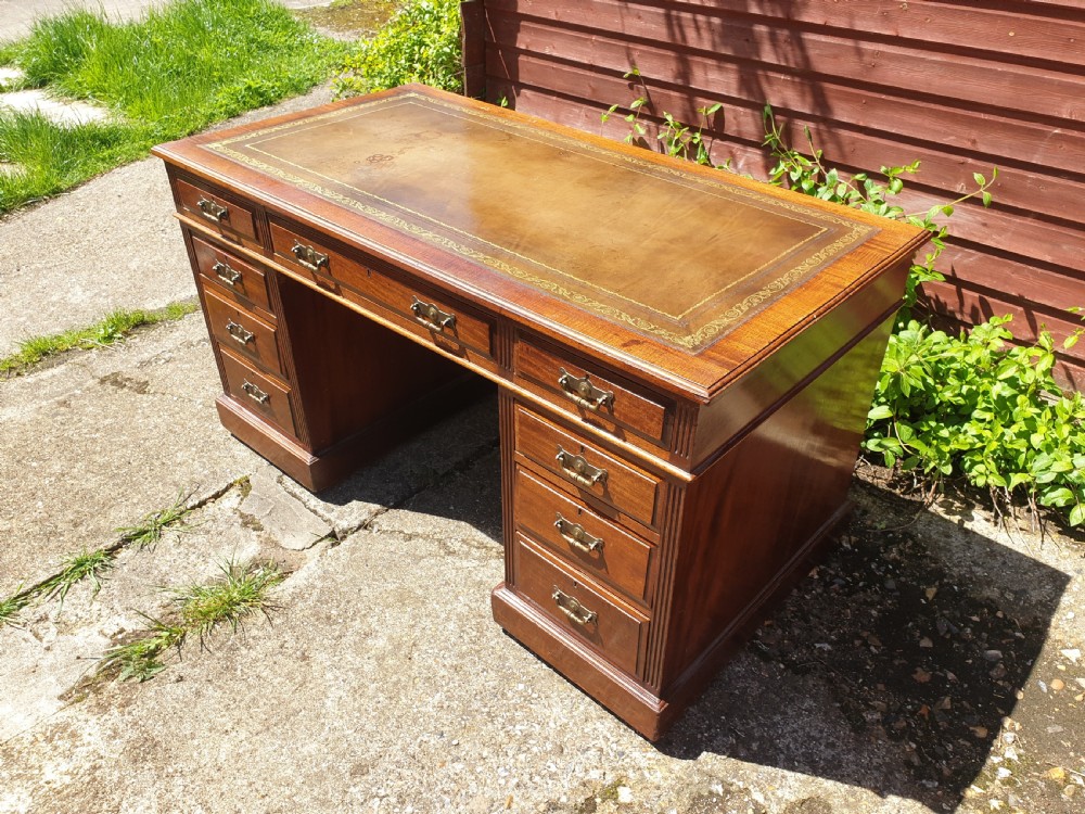 Late Victorian mahogany pedestal desk by Maples
