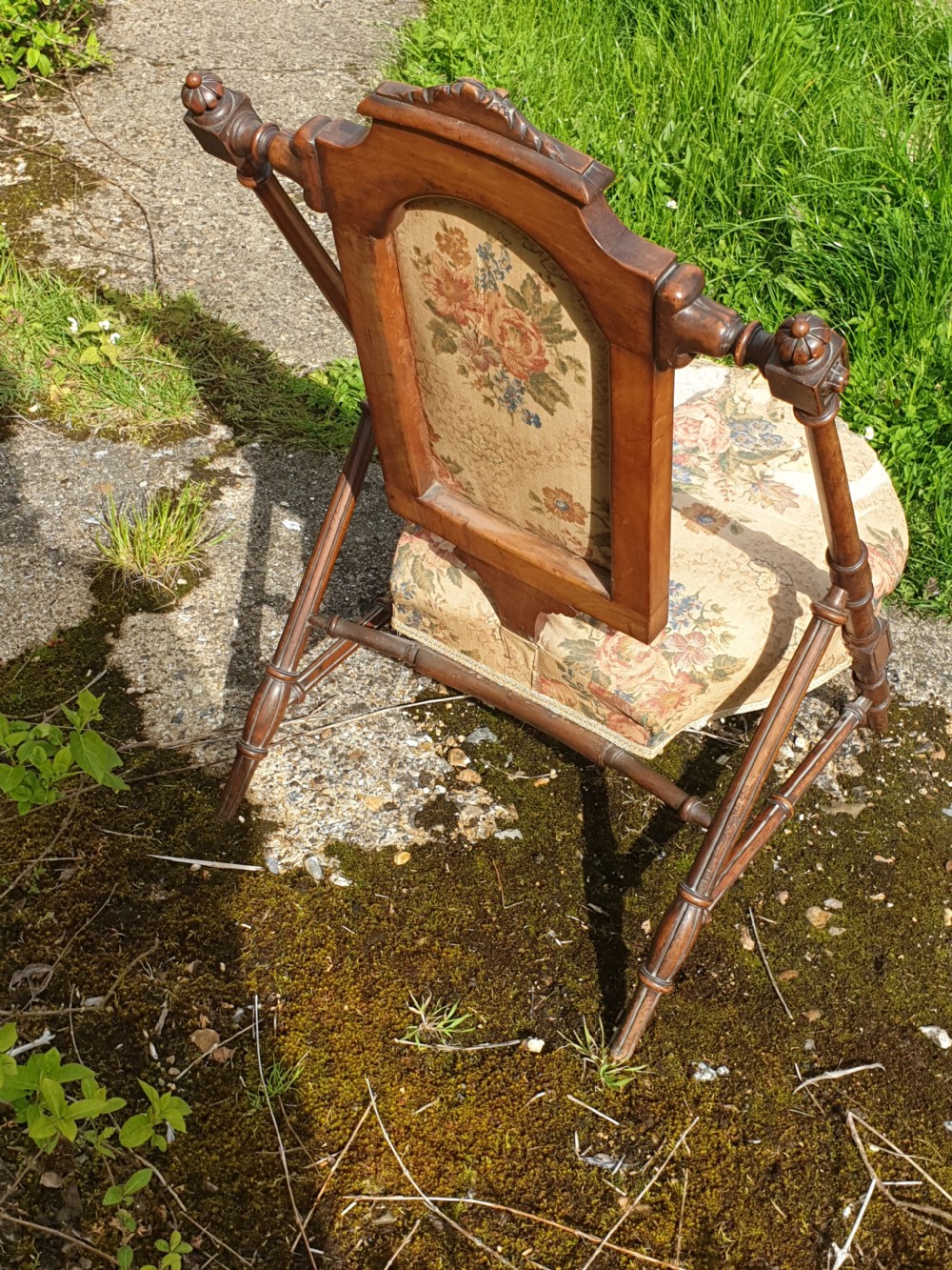 Late Victorian walnut nursing chair of unusual design.  View III