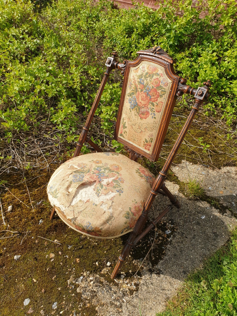 Late Victorian walnut nursing chair of unusual design.  View IV