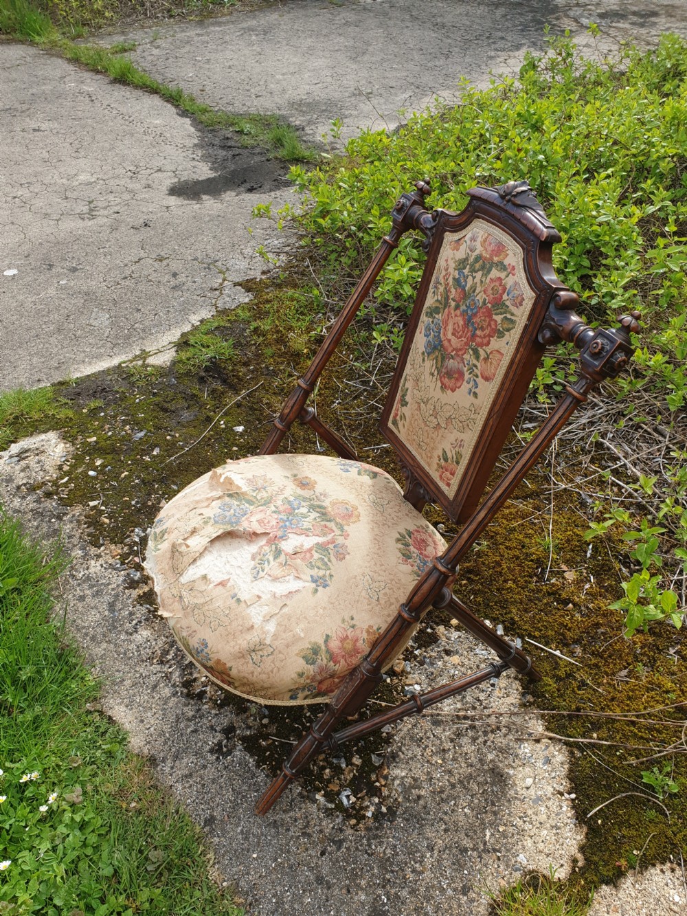Late Victorian walnut nursing chair of unusual design.  View VI