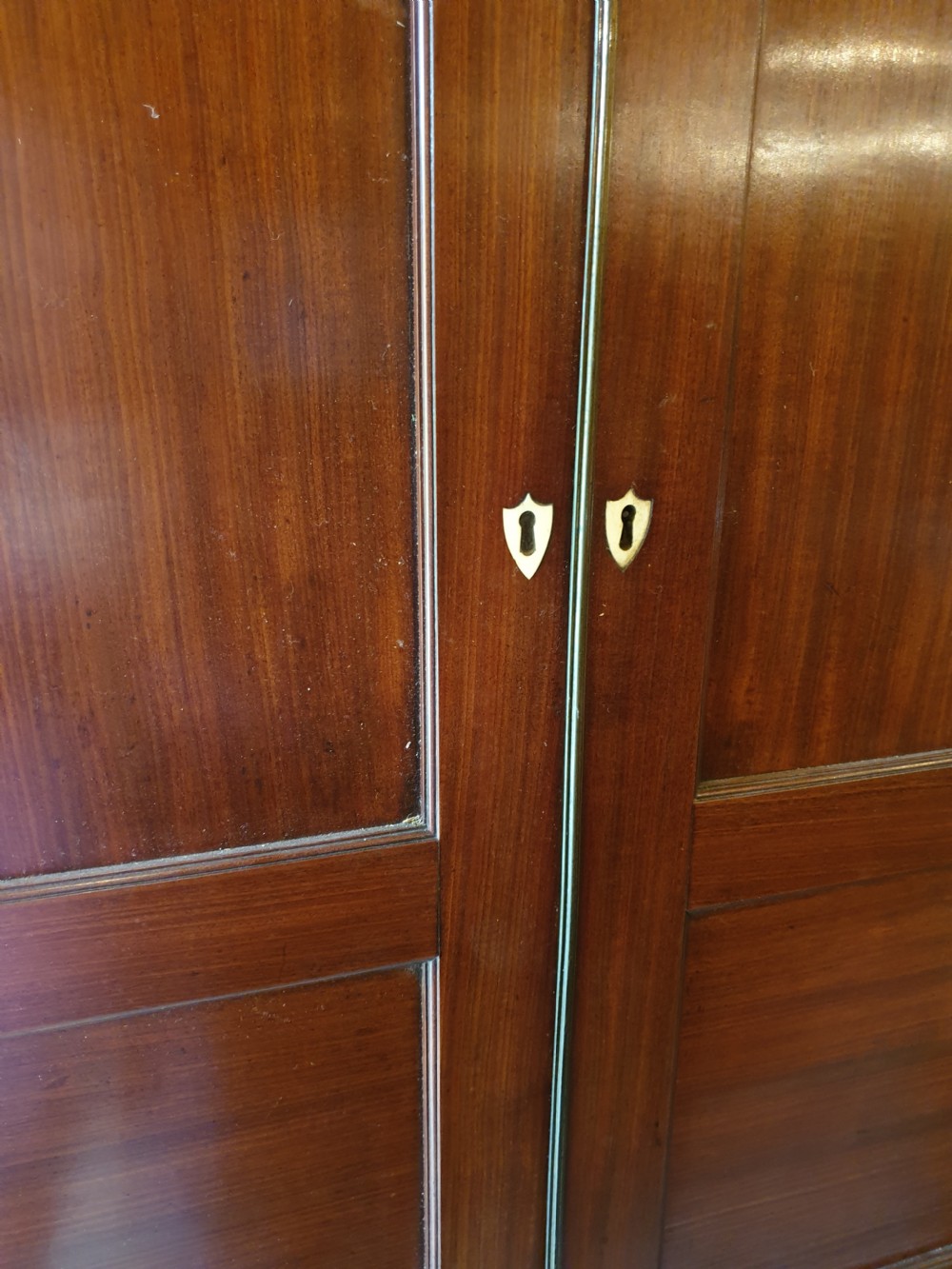 Good Regency mahogany 2 part corner cupboard.  View V
