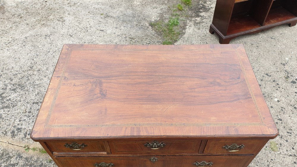 Georgian inlaid walnut chest of drawers  View II