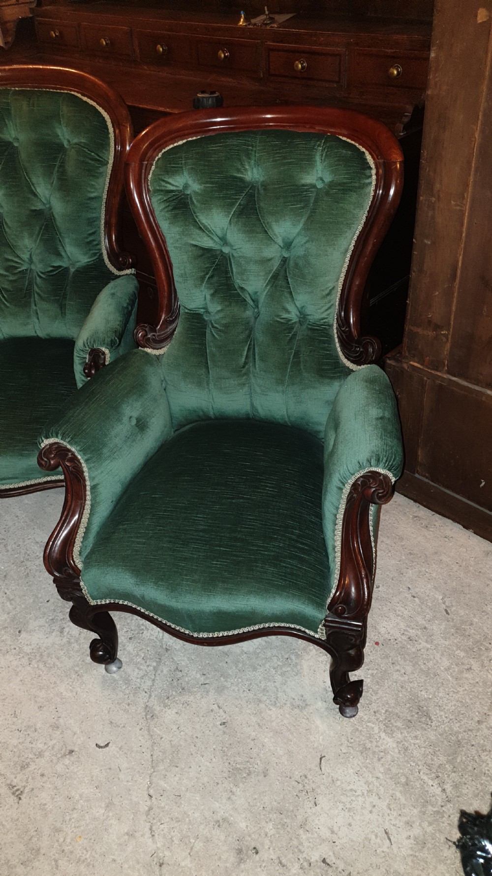 Close pair of Mahogany frame Spoon back upholstered armchairs.  View III