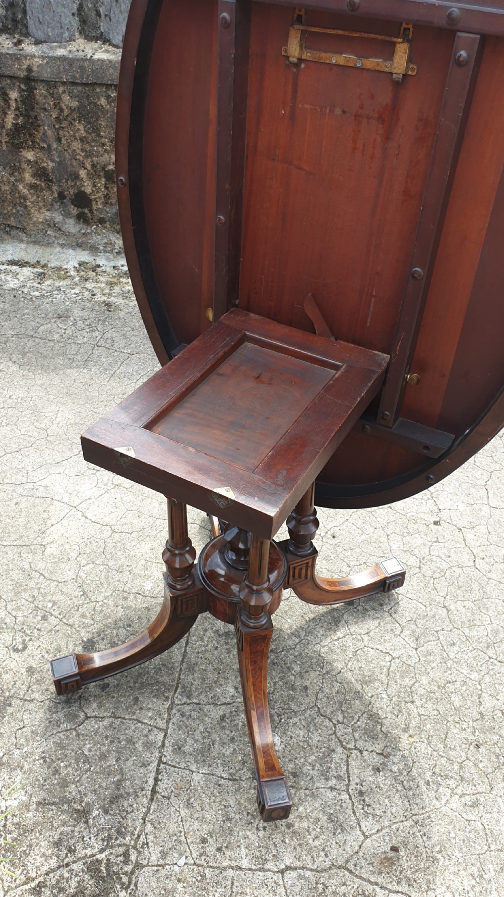 Victorian inlaid walnut oval tip top pedestal table.  View III