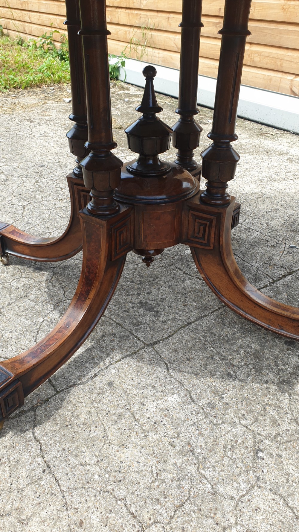 Victorian inlaid walnut oval tip top pedestal table.  View IV
