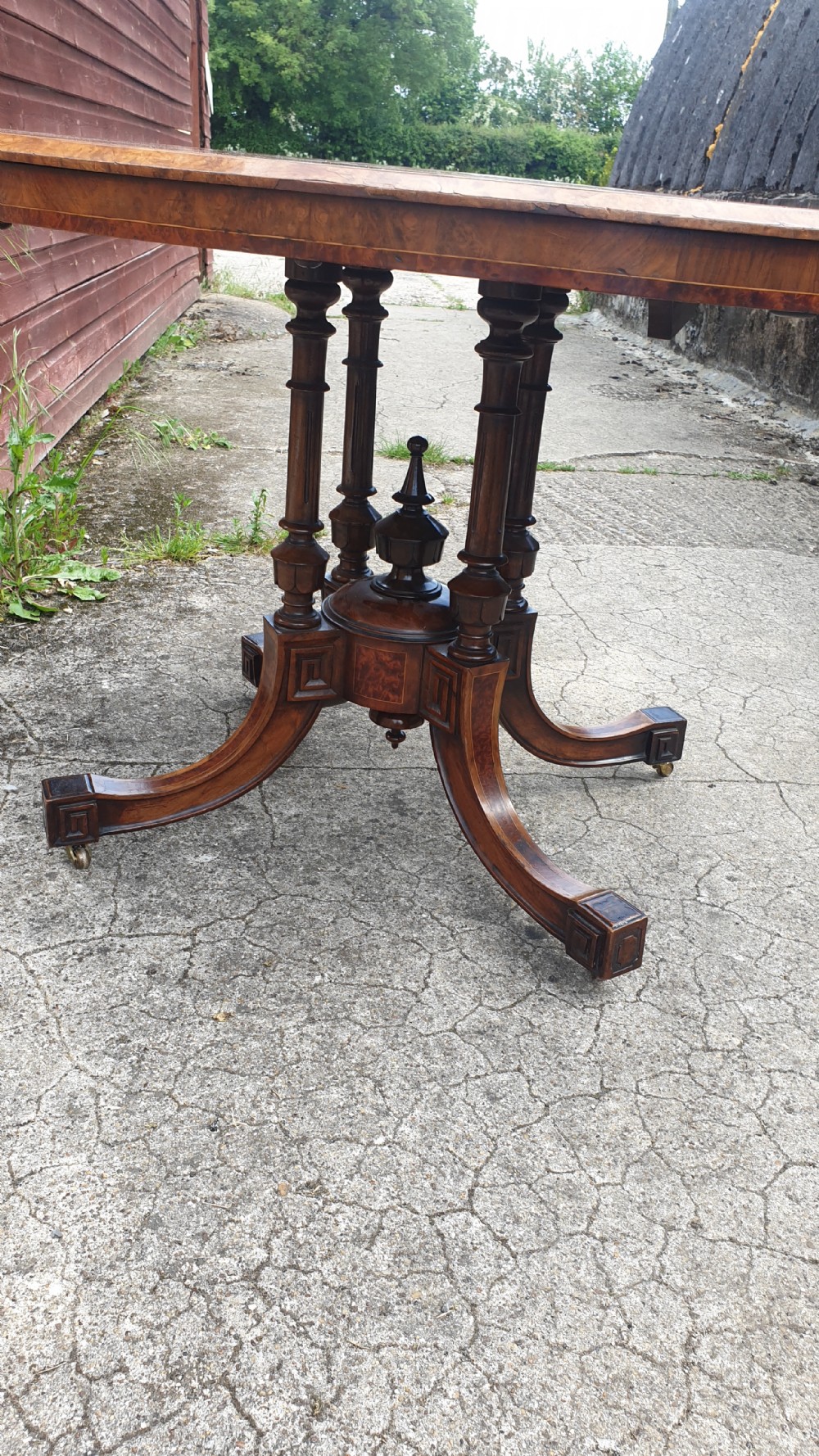 Victorian inlaid walnut oval tip top pedestal table.  View V