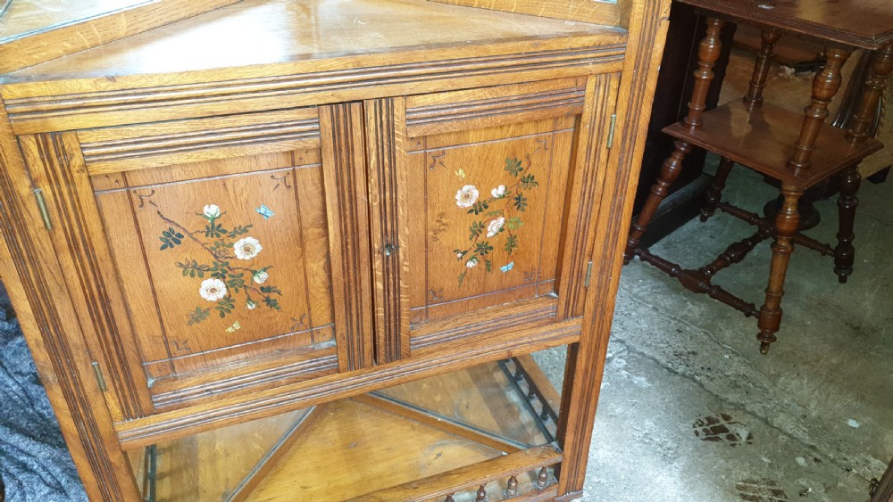 Victorian golden oak decorated corner cabinet.  View II