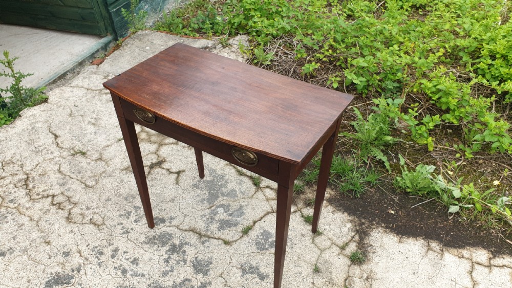 Early 19th century mahogany bow front side table.  View II