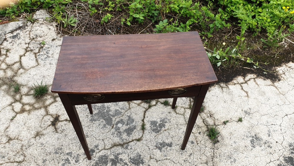 Early 19th century mahogany bow front side table.  View III
