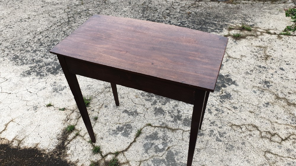 Early 19th century mahogany bow front side table.  View IV
