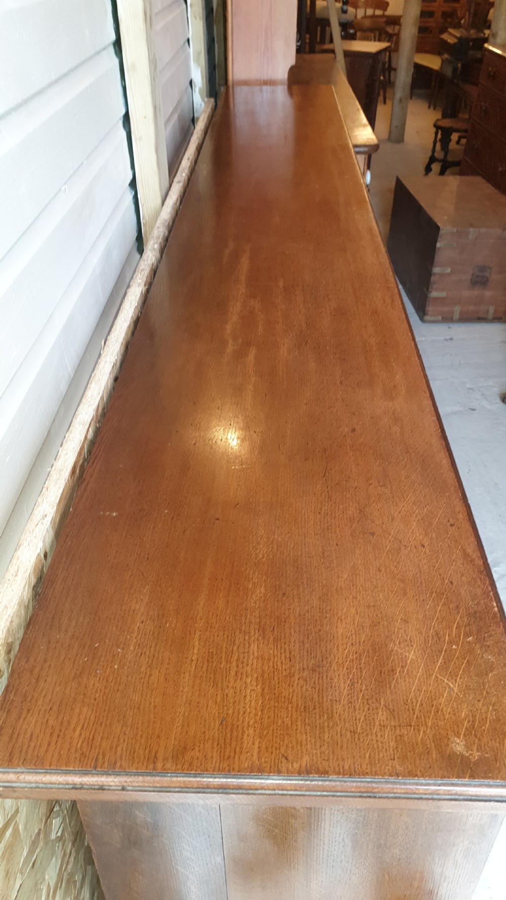8 foot practical oak Edwardian open front bookcase.  View III