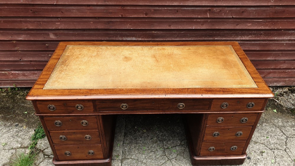 5 foot 19th century mahogany kneehole pedestal desk.  View II