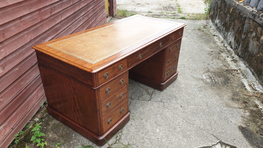 5 foot 19th century mahogany kneehole pedestal desk.  View VI