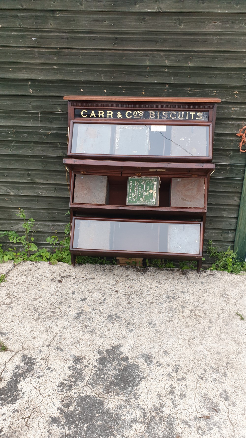 Late Victorian biscuit cabinet complete with biscuit tins. View II