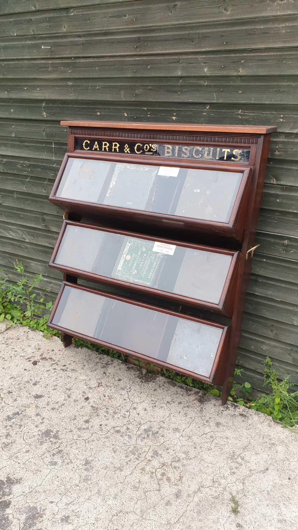Late Victorian biscuit cabinet complete with biscuit tins. View IV