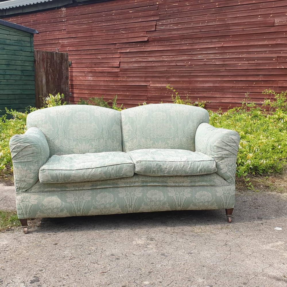 Edwardian Howard style upholstered 2 seater sofa.