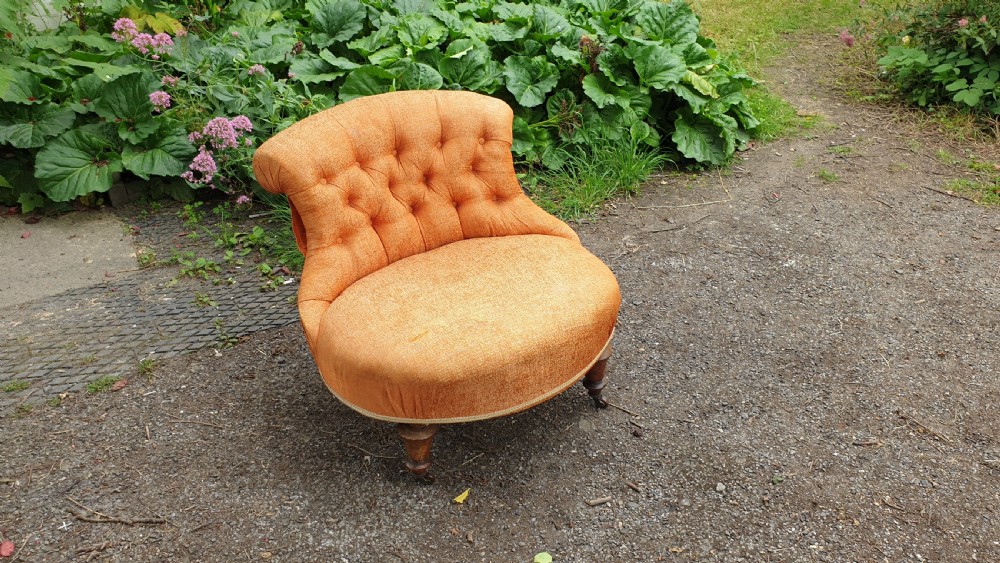 Larger than normal Victorian walnut nursing chair.