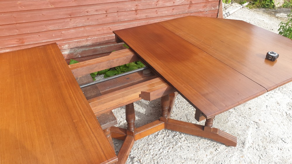Late Victorian walnut extending dining table. With makers stamp. View IX