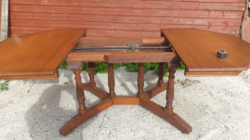 Late Victorian walnut extending dining table. With makers stamp. View X