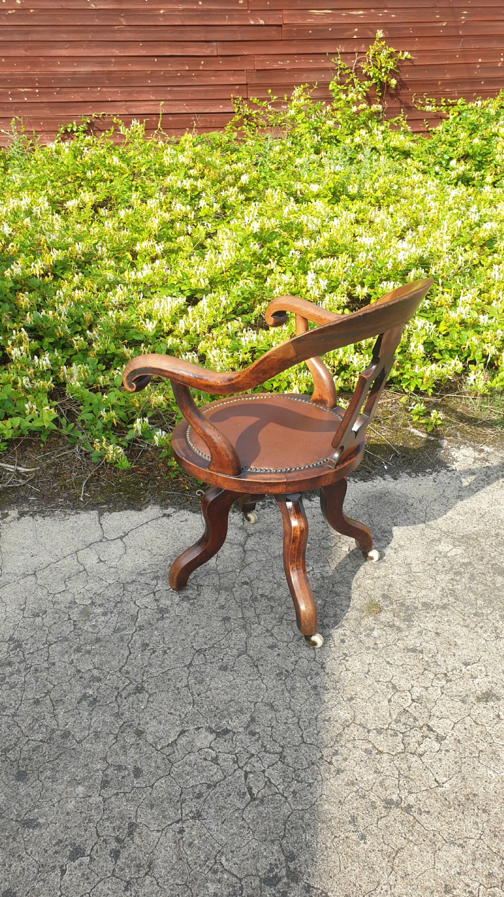 Late Victorian revolving desk armchair. View II